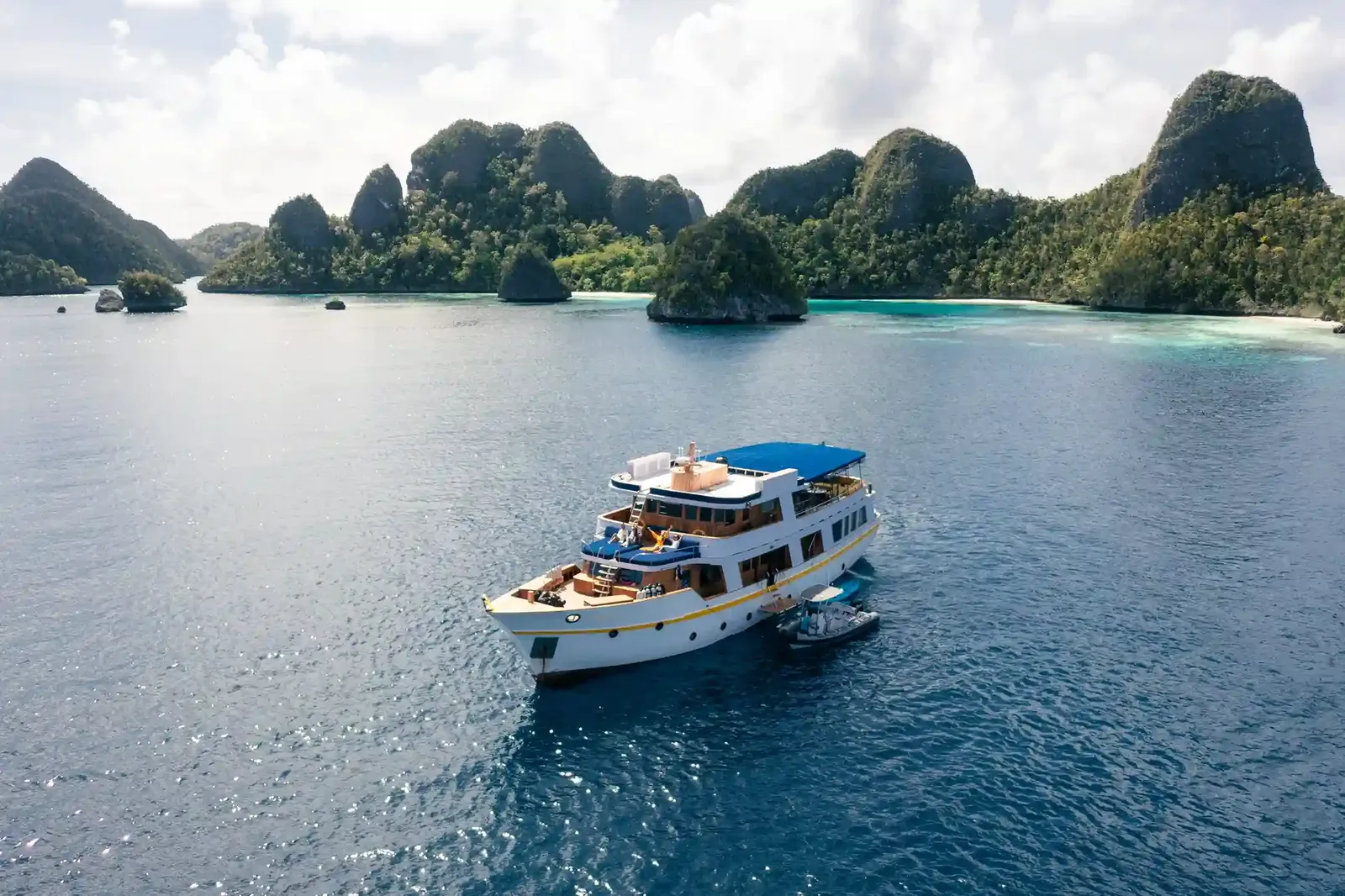 Raja Ampat charters are a separate fleet from the Komodo hulls.
