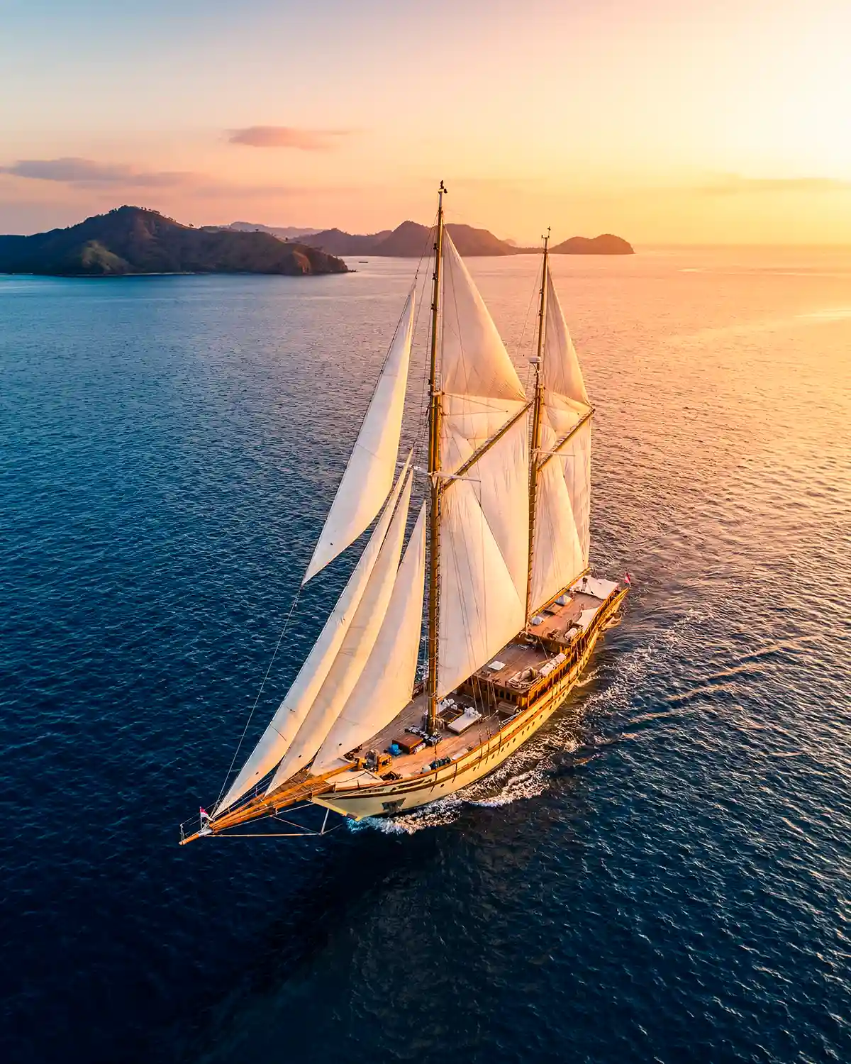Competing luxury liveaboards publish per-cabin rates.